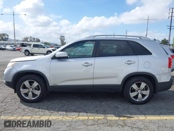2012 Kia Sorento EX with VIN 5XYKUDA28CG214253, listed as a IAAI auction lot 41902079 with 160,943 mi miles. Bid and sale history available at carsss.com. Image 12.