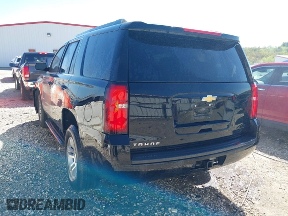 2020 Chevrolet Tahoe LS with VIN 1GNSCAKC6LR293472, listed as a IAAI auction lot 42014584 with 56,549 mi miles and . Bid and sale history available at DreamBid. Image 3.