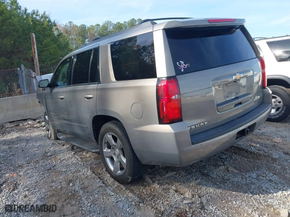 2017 Chevrolet Tahoe LS with VIN 1GNSCAKC7HR179715, listed as a IAAI auction lot 40948996 with 164,178 mi miles. Bid and sale history available at carsss.com. Image 3.
