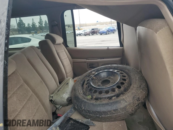 1999 Ford Explorer XLT with VIN 1FMZU34E6XZC14009, listed as a Copart auction lot 55251525 with 253,681 mi miles and Salvage title. Bid and sale history available at DreamBid. Image 11.