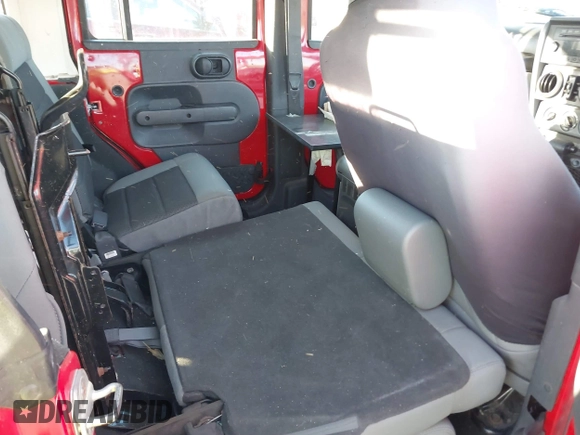 2009 Jeep Wrangler Unlimited X with VIN 1J4GZ39179L763057, listed as a IAAI auction lot 41829248 with 151,018 mi miles. Bid and sale history available at carsss.com. Image 8.