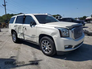 2015 GMC Yukon Denali with VIN 1GKS2CKJ3FR663324, listed as a Copart auction lot 70306614 with 154,234 mi miles and Salvage Title. Bid and sale history available at carsss.com. Image 4.