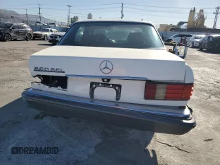 1986 Mercedes-Benz 560 with VIN WDBCA39D6GA238259, listed as a Copart auction lot 89204495 with 106,746 mi miles and Salvage Title. Bid and sale history available at DreamBid. Image 6.