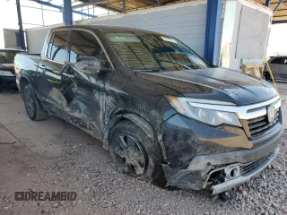2020 Honda Ridgeline RTL-E with VIN 5FPYK3F75LB009423, listed as a Copart auction lot 54187325 with 96,128 mi miles and Salvage title. Bid and sale history available at DreamBid. Image 4.