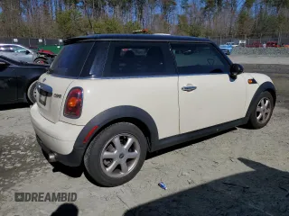 2008 MINI Hardtop with VIN WMWMF33508TT66699, listed as a Copart auction lot 48233985 with 88,817 mi miles and Salvage Title. Bid and sale history available at DreamBid. Image 3.