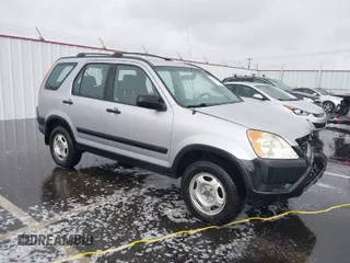 2004 Honda CR-V LX with VIN JHLRD78484C007197, listed as a IAAI auction lot 41581380 with 230,537 mi miles and . Bid and sale history available at carsss.com. Image 1.