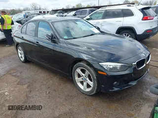 2014 BMW 3 Series 328i xDrive with VIN WBA3B3C58EJ982424, listed as a IAAI auction lot 42075568 with 190,009 mi miles. Bid and sale history available at carsss.com. Image 1.