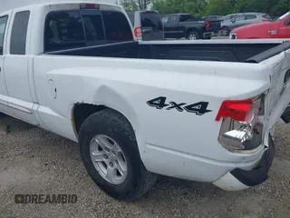 2005 Dodge Dakota SLT with VIN 1D7HW42N75S213191, listed as a IAAI auction lot 42345554 with 152,833 mi miles and . Bid and sale history available at DreamBid. Image 12.