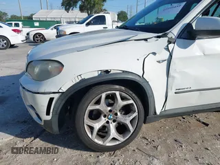 2011 BMW X5 35i with VIN 5UXZV4C52BL410497, listed as a IAAI auction lot 41995459 with 162,781 mi miles. Bid and sale history available at carsss.com. Image 6.