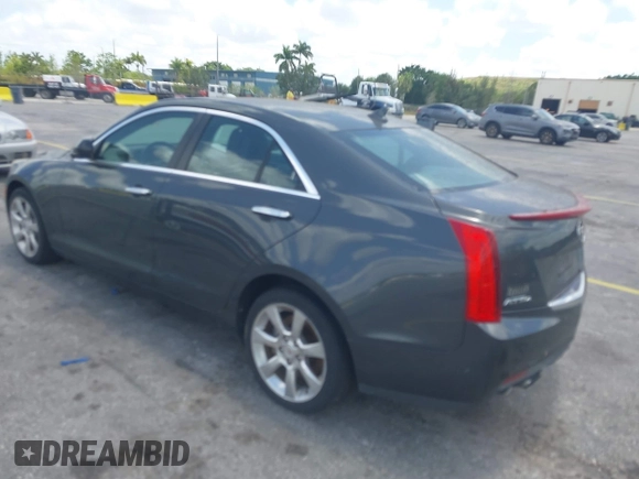2014 Cadillac ATS Standard AWD with VIN 1G6AG5RX9E0173779, listed as a IAAI auction lot 42172080 with 102,293 mi miles and . Bid and sale history available at carsss.com. Image 3.