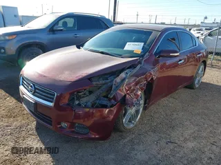 2013 Nissan Maxima S with VIN 1N4AA5AP7DC807233, listed as a IAAI auction lot 41760607 with 163,599 mi miles and . Bid and sale history available at DreamBid. Image 2.