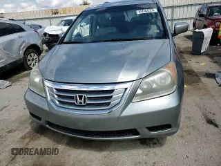 2010 Honda Odyssey EX-L с VIN 5FNRL3H79AB073307, выставлен на аукционе Copart как лот 55642225 с пробегом Не указан миль и Списание • Salvage title. История ставок и продаж доступна на DreamBid. Изображение 14.