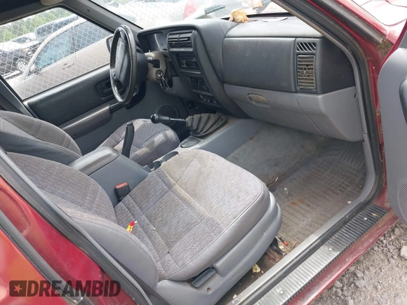 1998 Jeep Cherokee Sport with VIN 1J4FJ68S0WL117837, listed as a IAAI auction lot 42125538 with 1 mi miles. Bid and sale history available at carsss.com. Image 5.
