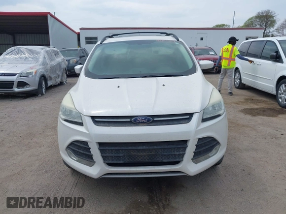 2014 Ford Escape SE with VIN 1FMCU9GX9EUB15944, listed as a IAAI auction lot 42110269 with 120,297 mi miles and . Bid and sale history available at DreamBid. Image 6.