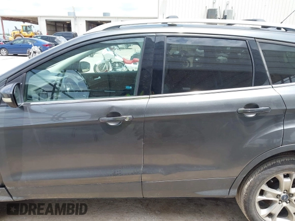 2015 Ford Escape Titanium z VIN 1FMCU0JX3FUA71770, wystawiony jako IAAI lot #42085635 z przebiegiem 141 890 mil mil oraz . Historia ofert i sprzedaży dostępna na DreamBid. Obrazek 14.