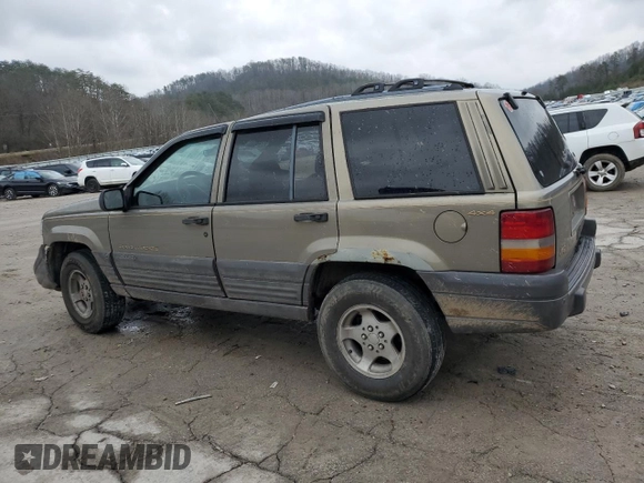 1996 Jeep Grand Cherokee Laredo with VIN 1J4GZ58Y5TC378100, listed as a Copart auction lot 85493724 with 0 mi miles and Salvage Title. Bid and sale history available at carsss.com. Image 2.