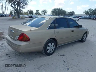 2001 Toyota Avalon XL with VIN 4T1BF28B81U144281, listed as a IAAI auction lot 41563820 with 169,911 mi miles and . Bid and sale history available at DreamBid. Image 4.