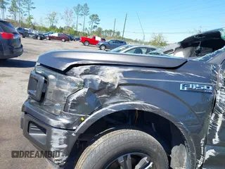 2019 Ford F-150 XL with VIN 1FTEW1CP7KKE73193, listed as a IAAI auction lot 41828951 with 87,741 mi miles and . Bid and sale history available at DreamBid. Image 6.