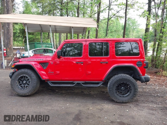 2018 Jeep Wrangler Unlimited Rubicon with VIN 1C4HJXFG3JW273266, listed as a IAAI auction lot 42093919 with 90,700 mi miles and . Bid and sale history available at DreamBid. Image 14.