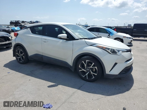 2018 Toyota C-HR XLE with VIN NMTKHMBX2JR045151, listed as a Copart auction lot 54699505 with 122,431 mi miles and Salvage Title. Bid and sale history available at carsss.com. Image 4.
