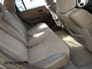 2003 Honda CR-V LX with VIN JHLRD68513C009276, listed as a IAAI auction lot 41563452 with 240,519 mi miles and . Bid and sale history available at DreamBid. Image 8.