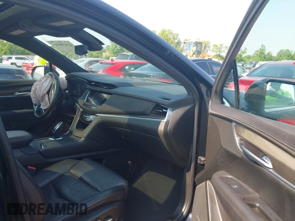 2017 Cadillac XT5 Platinum AWD with VIN 1GYKNFRS6HZ130626, listed as a IAAI auction lot 42470536 with 128,129 mi miles and . Bid and sale history available at DreamBid. Image 5.