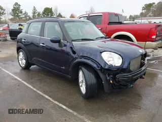 2013 MINI Countryman S ALL4 with VIN WMWZC5C51DWM15816, listed as a IAAI auction lot 41734311 with 134,636 mi miles and . Bid and sale history available at DreamBid. Image 1.