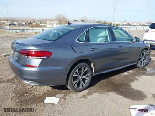 2021 Volkswagen Passat 2.0T SE with VIN 1VWSA7A39MC009031, listed as a IAAI auction lot 41138267 with 108,866 mi miles. Bid and sale history available at carsss.com. Image 4.