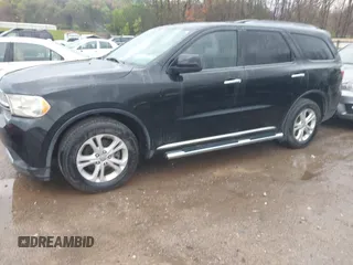 2013 Dodge Durango Crew with VIN 1C4RDHDG5DC613835, listed as a IAAI auction lot 41910643 with 155,827 mi miles and . Bid and sale history available at DreamBid. Image 17.