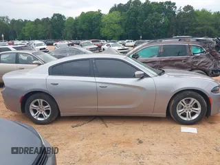 2015 Dodge Charger SE z VIN 2C3CDXBGXFH812970, wystawiony jako IAAI lot #42302350 z przebiegiem 204 107 mil mil oraz . Historia ofert i sprzedaży dostępna na DreamBid. Obrazek 13.
