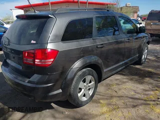 2017 Dodge Journey SE with VIN 3C4PDCAB9HT503979, listed as a IAAI auction lot 42116429 with 176,591 mi miles and . Bid and sale history available at DreamBid. Image 4.