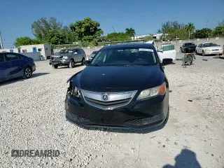 2014 Acura ILX z VIN 19VDE1F3XEE012920, wystawiony jako Copart lot #56931455 z przebiegiem 137 002 mil mil oraz Szkoda całkowita • Salvage title. Historia ofert i sprzedaży dostępna na DreamBid. Obrazek 13.