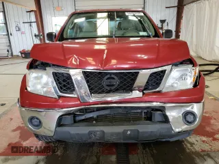 2011 Nissan Frontier Pro-4X with VIN 1N6AD0EV2BC400945, listed as a Copart auction lot 58693635 with 122,209 mi miles and Salvage title. Bid and sale history available at DreamBid. Image 5.