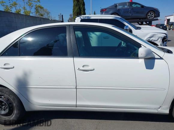 2004 Toyota Camry LE with VIN 4T1BE32KX4U284600, listed as a IAAI auction lot 41855214 with 116,758 mi miles. Bid and sale history available at carsss.com. Image 14.