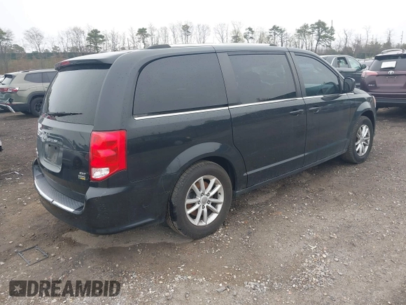 2019 Dodge Grand Caravan SXT with VIN 2C4RDGCG6KR749505, listed as a IAAI auction lot 42087083 with 167,551 mi miles and . Bid and sale history available at DreamBid. Image 4.