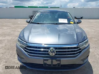 2019 Volkswagen Jetta S z VIN 3VWC57BUXKM061537, wystawiony jako IAAI lot #42170921 z przebiegiem 88 476 mil mil oraz . Historia ofert i sprzedaży dostępna na DreamBid. Obrazek 12.