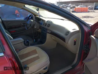 2004 Chrysler 300M with VIN 2C3AE66GX4H680606, listed as a IAAI auction lot 41394101 with 164,677 mi miles. Bid and sale history available at carsss.com. Image 5.