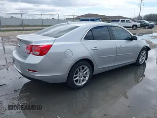 2014 Chevrolet Malibu LT with VIN 1G11C5SL4EF123944, listed as a IAAI auction lot 42160894 with 157,459 mi miles and . Bid and sale history available at DreamBid. Image 4.