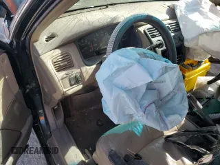 2000 Honda Accord EX с VIN 1HGCG1650YA077850, выставлен на аукционе Copart как лот 57105575 с пробегом Не указан миль и Списание • Salvage title. История ставок и продаж доступна на DreamBid. Изображение 9.