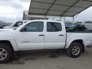2011 Toyota Tacoma with VIN 5TFJX4GN7BX001567, listed as a IAAI auction lot 42066703 with 199,807 mi miles and . Bid and sale history available at DreamBid. Image 14.