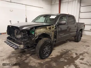 2019 Toyota Tacoma 4WD SR with VIN 3TMCZ5AN9KM275537, listed as a IAAI auction lot 41956988 with 102,933 mi miles. Bid and sale history available at carsss.com. Image 20.