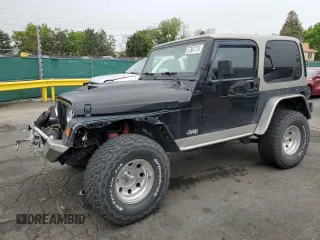 2002 Jeep Wrangler Sport z VIN 1J4FA49S32P772273, wystawiony jako Copart lot #57567175 z przebiegiem 201 150 mil mil oraz Szkoda całkowita • Salvage title. Historia ofert i sprzedaży dostępna na DreamBid. Obrazek 1.