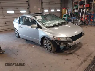 2010 Honda Civic Cpe EX with VIN 2HGFG1B8XAH522793, listed as a IAAI auction lot 41978533 with 146,443 mi miles. Bid and sale history available at carsss.com. Image 1.