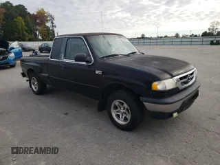 2001 Mazda B-Series 2WD Truck DS with VIN 4F4YR16V91TM23118, listed as a Copart auction lot 76834574 with 240,263 mi miles and Salvage Title. Bid and sale history available at carsss.com. Image 4.
