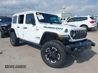 2024 Jeep Wrangler Rubicon X с VIN 1C4RJXR62RW211456, выставлен на аукционе IAAI как лот 42167755 с пробегом 27 466 миль миль и . История ставок и продаж доступна на DreamBid. Изображение 1.