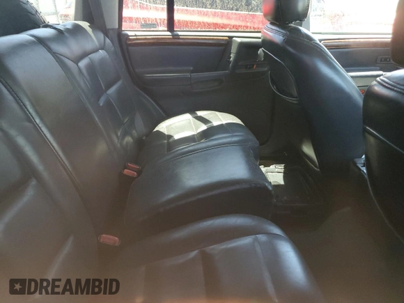 1997 Jeep Grand Cherokee Limited with VIN 1J4GZ78Y7VC573971, listed as a Copart auction lot 61358024 with 171,055 mi miles and Salvage Title. Bid and sale history available at carsss.com. Image 10.