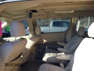 2007 Nissan Quest S with VIN 5N1BV28U77N127494, listed as a IAAI auction lot 41445049 with 210,641 mi miles. Bid and sale history available at carsss.com. Image 8.