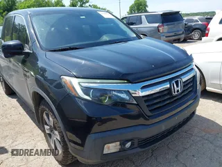 2018 Honda Ridgeline RTL-T with VIN 5FPYK3F67JB013171, listed as a IAAI auction lot 42498827 with 124,415 mi miles and . Bid and sale history available at DreamBid. Image 1.