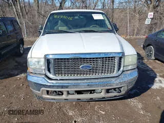 2002 Ford Excursion Limited z VIN 1FMNU43S32ED21966, wystawiony jako IAAI lot #41395015 z przebiegiem 224 696 mil mil oraz . Historia ofert i sprzedaży dostępna na DreamBid. Obrazek 12.