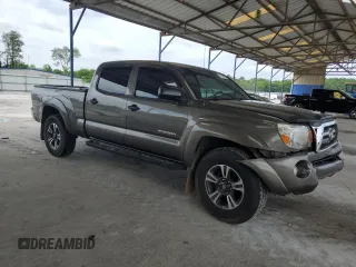 2009 Toyota Tacoma PreRunner with VIN 3TMKU72N89M021378, listed as a Copart auction lot 57142405 with 199,745 mi miles and Salvage title. Bid and sale history available at DreamBid. Image 4.